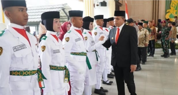 Pj Bupati Langkat Faisal Hasrimy Kukuhkan 58 Anggota Paskibraka: Ini Tugas Mulia pada HUT RI ke-79